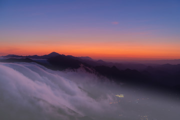 Fototapeta premium Cloud flow down the mountain