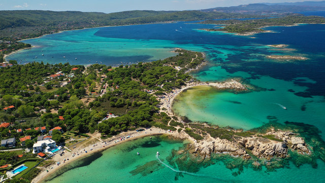 Aerial drone photo of iconic turquoise paradise sandy twin beaches of Karidi in Sithonia Peninsula, Vourvourou bay, Halkidiki, North Greece © aerial-drone