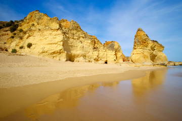 View on beautiful cliff in Algarve. Beach Careanosy in Portimao. Vacation in Portugal.