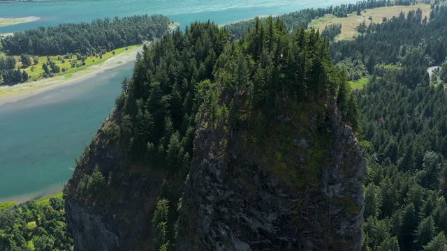Beacon Rock, an 848-foot (258 m) basalt volcanic plug on the north shore of the Columbia River 32 miles (51 km) east of Vancouver. It was named by Lewis and Clark in 1805.  