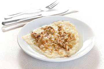 honey with cream and walnut platter on white background