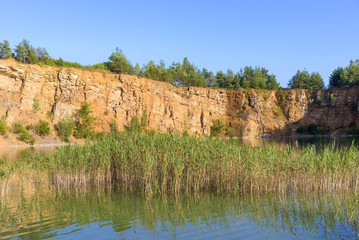 Fototapeta premium Pond in an old quarry in Grodek park in Jaworzno
