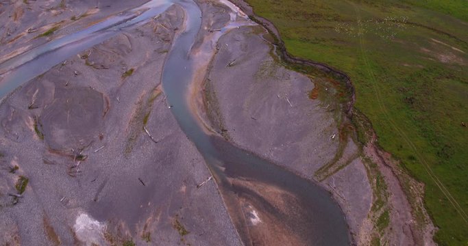 low-level flight on a cloudy day, in the delta of the river that feeds the waters of Lake Caburgua