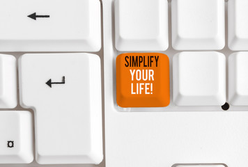 Writing note showing Simplify Your Life. Business concept for focused on important and let someone...