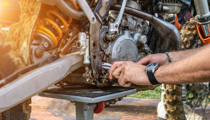 motor  mechanic working in garage. Repair service.