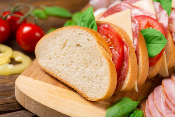 chopped loaf with ham and cherry tomatoes d, close-up 
