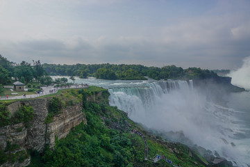 Niagara Falls, NY: Tourists on Prospect Point get a close up view of the American Falls.