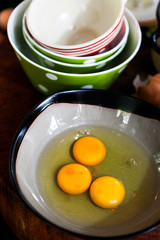Eggs yoke in bowl prepare for making scramble egg