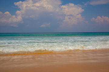 Fototapeta na wymiar Beautiful waves clear waters blue sea karon beach attractions