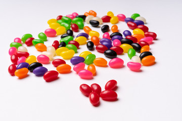 colorful jelly beans candies white background Top view