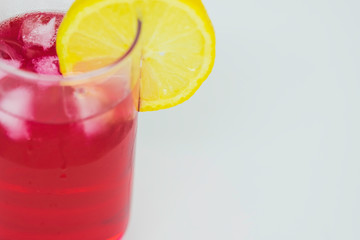 Strawberry drink with sicilian lemon on white background.