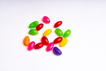 colorful jelly beans candies white background Top view