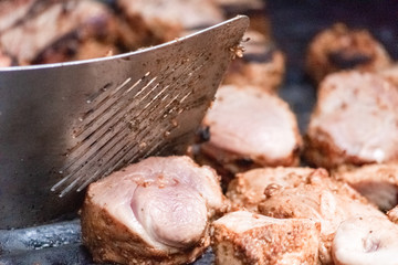 Yummy meat on the grill in the garden with spicy  and sour taste