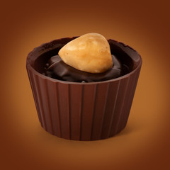Small chocolate basket with cream and nut on a brown background