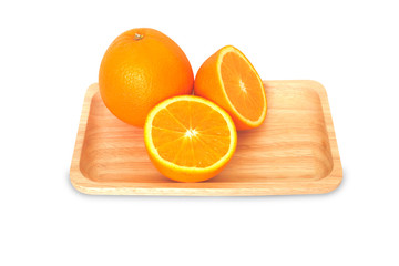 Fresh orange with a half on square tray isolate on white background