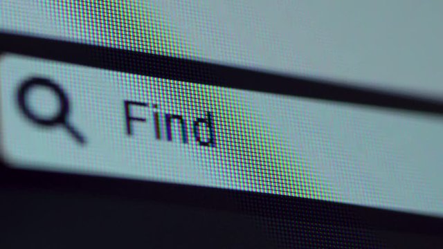 Browser bar with Find Job text typed on the computer screen. Shot in 4k resolution