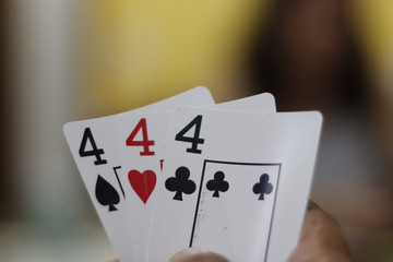 A beautiful view of three of a kind poker cards