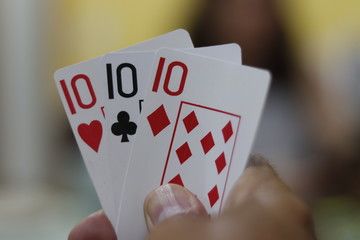 A beautiful view of three of a kind poker cards