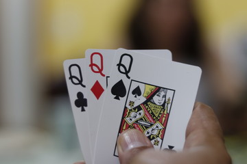 A beautiful view of three of a kind poker cards