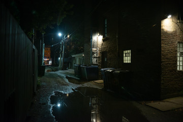 Dark and eerie urban city alley at night - Powered by Adobe