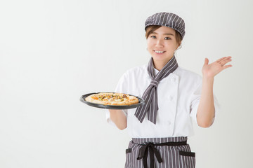 コックコートを着た女性