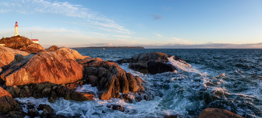Beautiful Panoramic view of a rocky ocean coast during a vibrant sunny sunset. Taken in Lighthouse Park, Horseshoe Bay, West Vancouver, British Columbia, Canada.