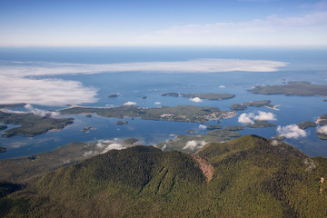 Aerial Landscape View of a touristic town, Tofino, on the Pacific Ocean Coast during a sunny summer morning. Taken in Vancouver Island, British Columbia, Canada.