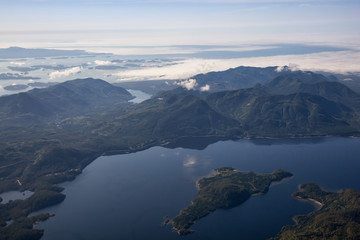Aerial Landscape View of Kennedy Lake and Pacific Ocean Coast during a sunny summer morning. Taken...