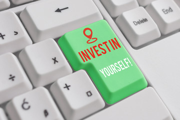 Text sign showing Invest In Yourself. Business photo showcasing learn new things or materials thus making your lot better White pc keyboard with empty note paper above white background key copy space