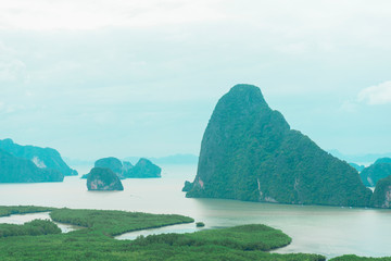Unidentified people sightseeing at Samet Nang She point looking through Phang Nga Bay in Phang Nga, Thailand
