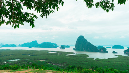 Unidentified people sightseeing at Samet Nang She point looking through Phang Nga Bay in Phang Nga, Thailand