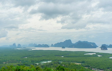 Unidentified people sightseeing at Samet Nang She point looking through Phang Nga Bay in Phang Nga, Thailand