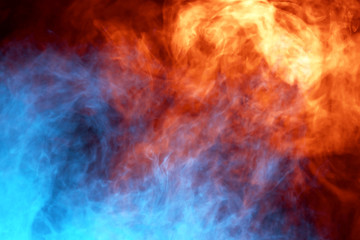 Fototapeta premium Abstract art colored smoke on black isolated background