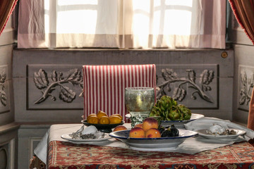 Stockholm, Sweden A table setting at the Skokloster Castle an hour north of Stockholm, a baroque masterpiece built in 1654, with fruits and vegetables.