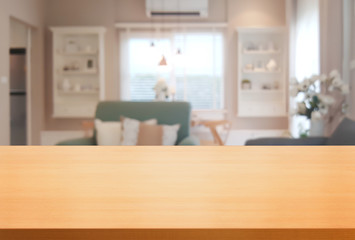 Wood table in modern home room interior with empty copy space on the table for product display...