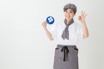 コックコートを着た女性