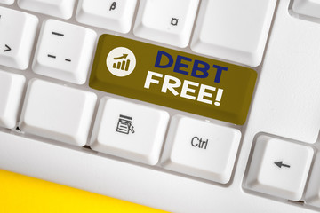 Conceptual hand writing showing Debt Free. Concept meaning does not owning any money or things to...