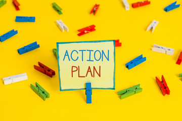 Text sign showing Action Plan. Business photo text detailed plan outlining actions needed to reach goals or vision Colored clothespin papers empty reminder yellow floor background office