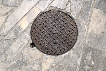 grey manhole cover