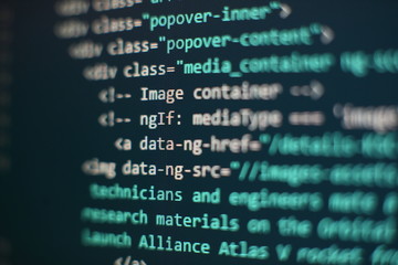 Programmer workplace. Big data storage and cloud computing representation. Programming code. Website development. Web site codes on computer monitor. Abstract screen of software. Computer script.