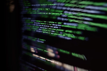 Programmer workplace. Big data storage and cloud computing representation. Programming code. Website development. Web site codes on computer monitor. Abstract screen of software. Computer script.