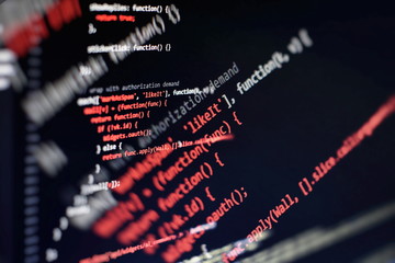 Programmer workplace. Big data storage and cloud computing representation. Programming code. Website development. Web site codes on computer monitor. Abstract screen of software. Computer script.