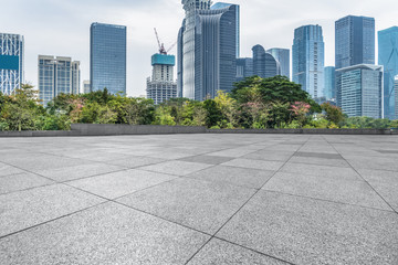 Panoramic skyline and buildings with empty square floor.