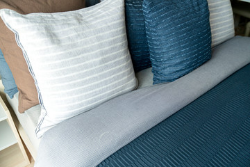 close up white beige soft pillows on bed and blanket bedroom interior design concept.bed maid luxury ideas concept