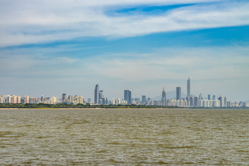 cityscape of modern city near water