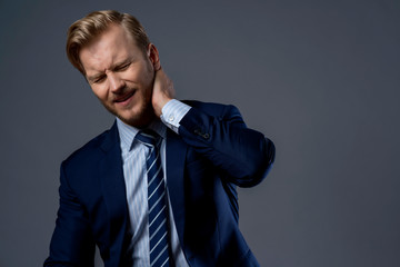 bad feeling with overwork caucasian businessman hand touch part of body hurt and painful emotion office syndrome ideas concept