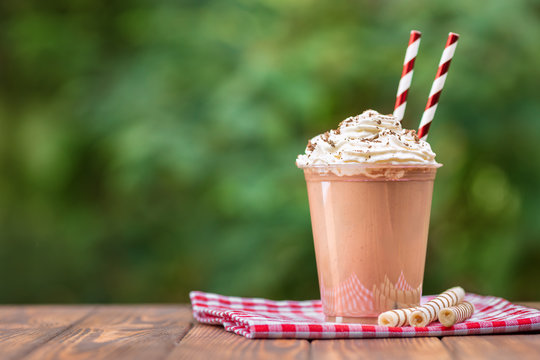 milkshake in disposable plastic cup