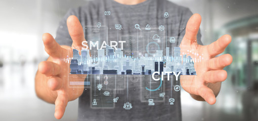 Businessman holding Smart city user interface with icon, stats and data 3d rendering