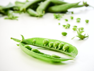 green pea pod on white background