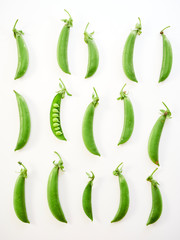 green pea pod on white background